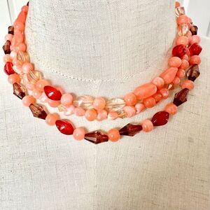 Orange beaded multi strand necklace